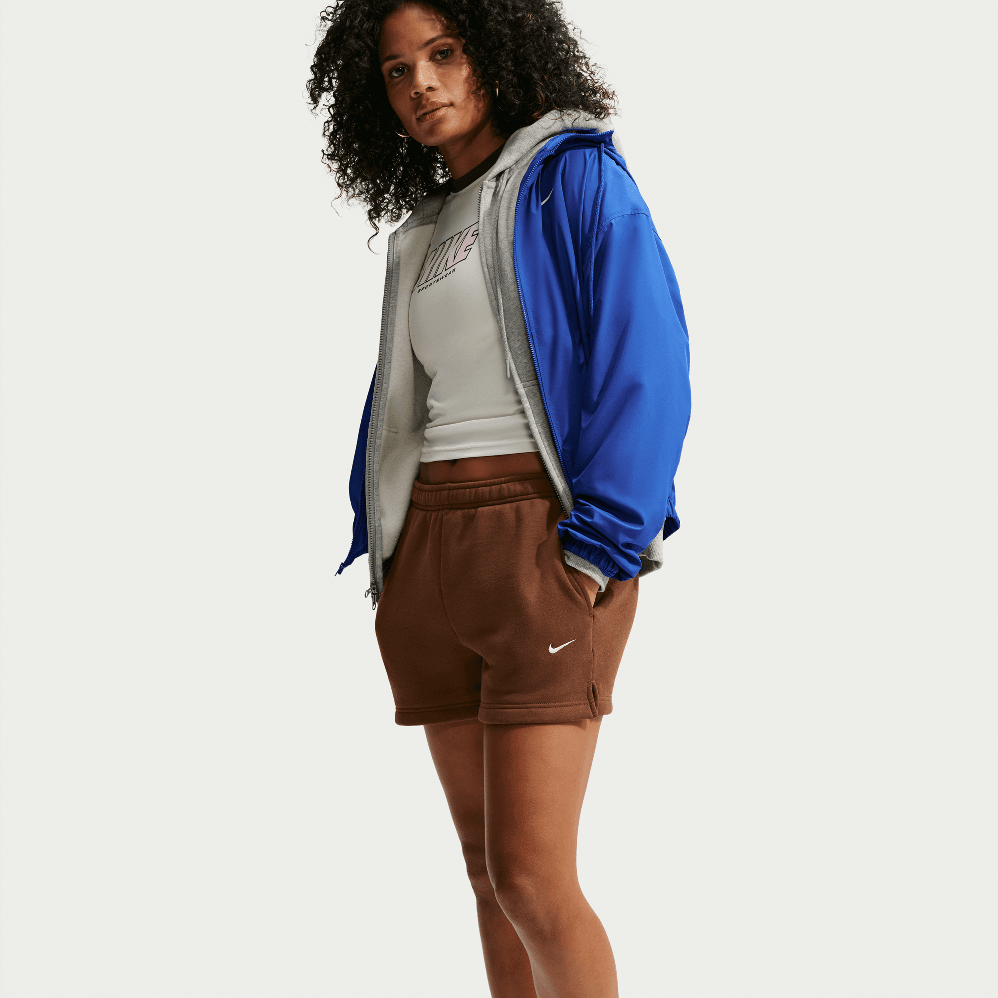 NIKE W NK STDO FLC MW MR STD 4 SHRT Hosen NIKE