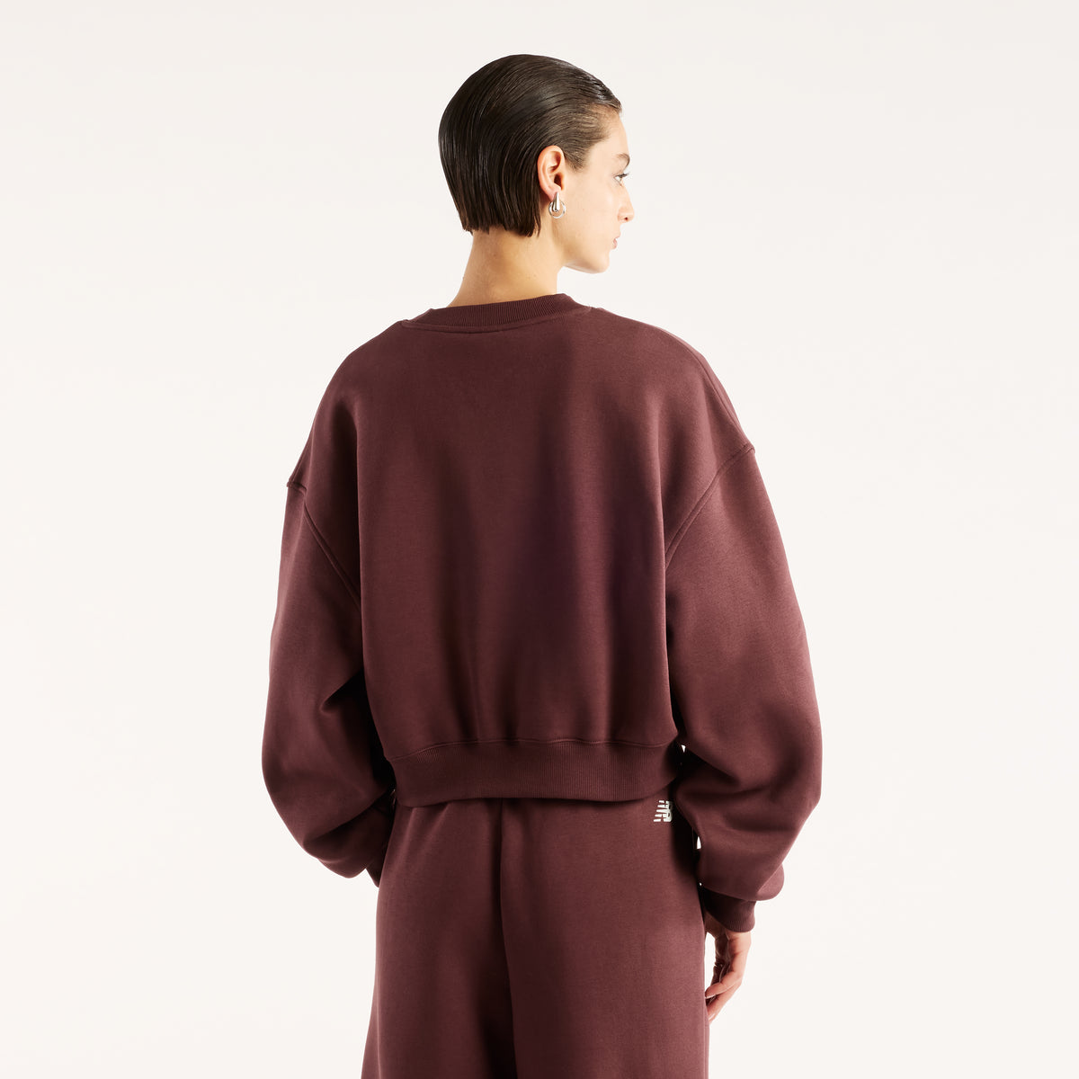NEW BALANCE Trackside Fleece Crew Freizeitpullover NEW BALANCE