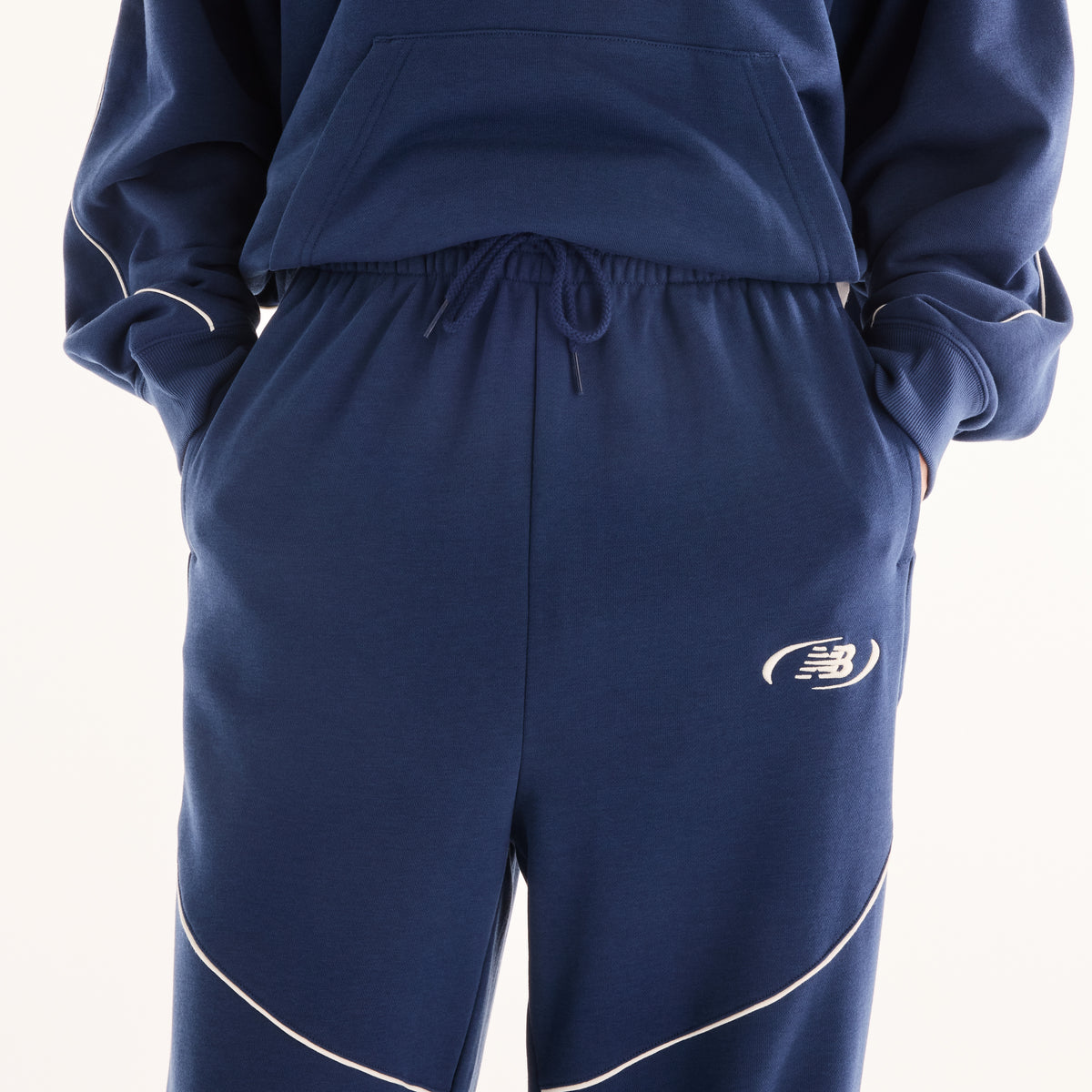 NEW BALANCE Trackside French Terry Pant Freizeithosen NEW BALANCE