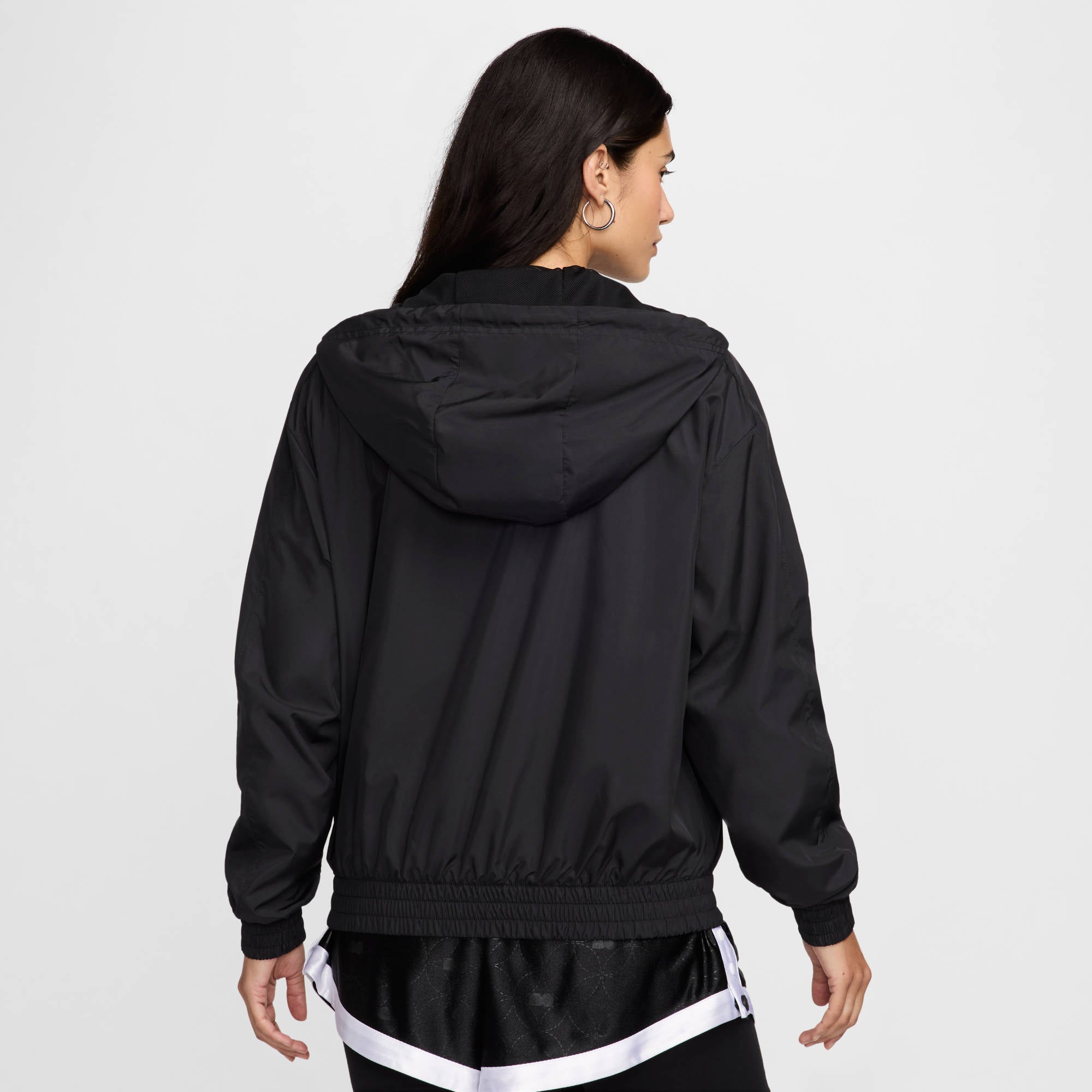 NIKE W NSW ESSNTL UV WVN JKT HD Trainingsjacken NIKE
